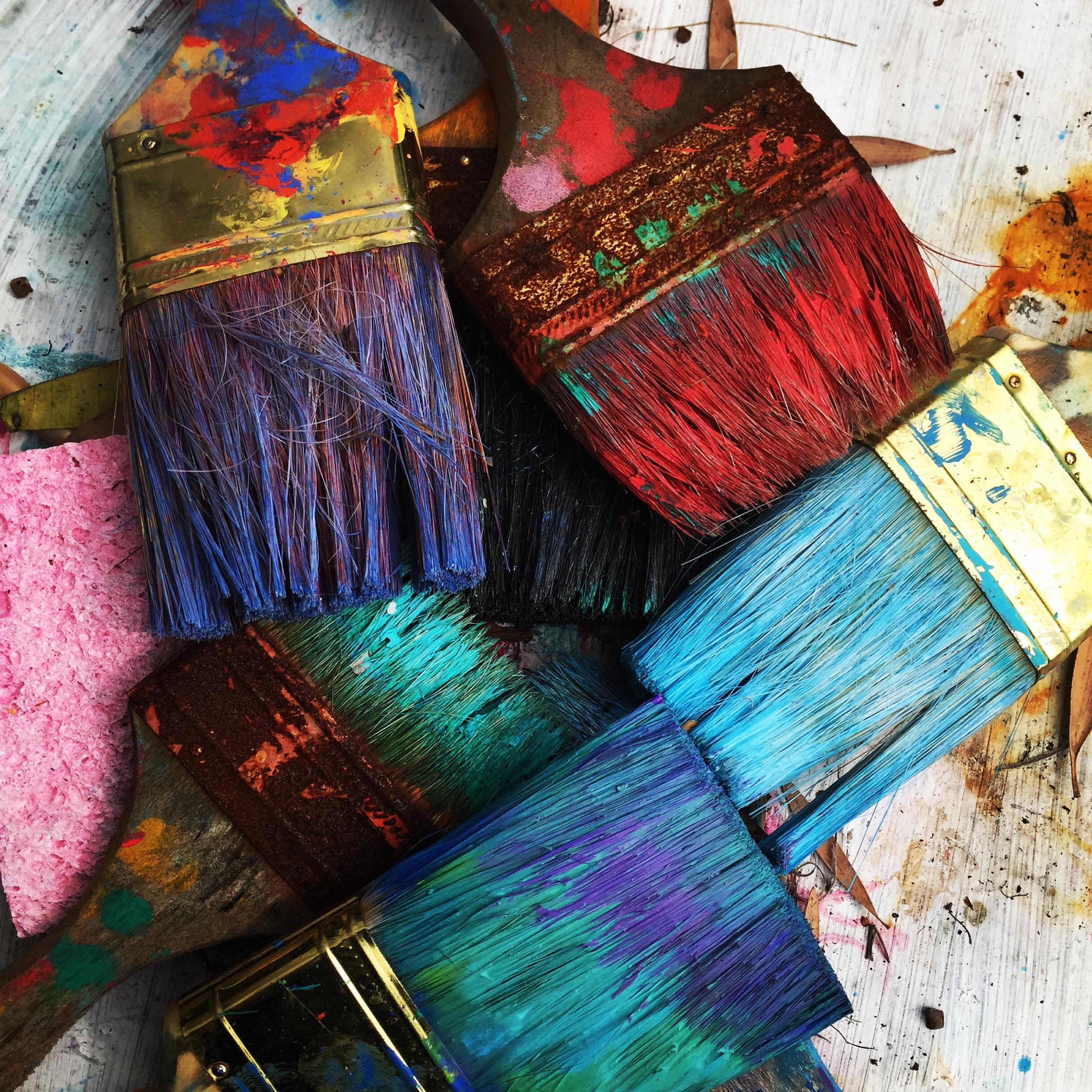 Artistic photo of paint brushes representing a creative painting motif