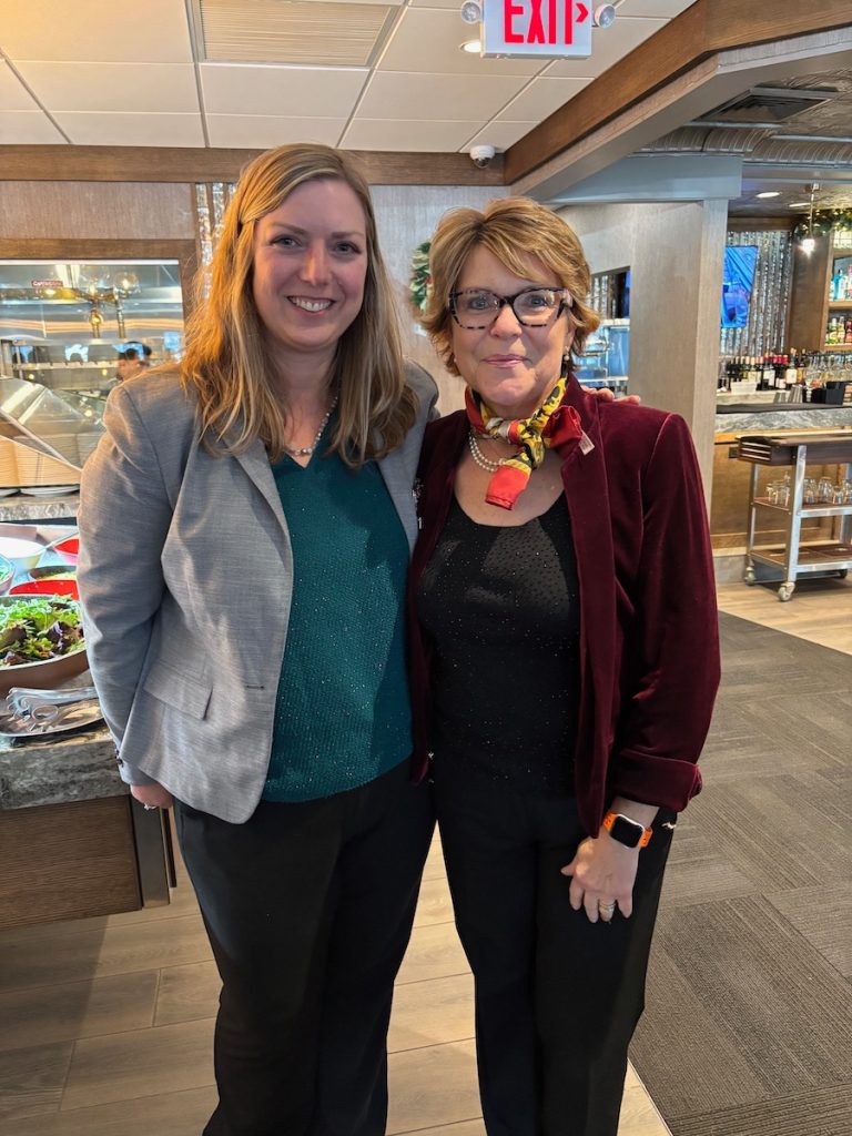 Michelle McQueen and Martha Stansbury at the WEDLI Holiday Luncheon 2024.