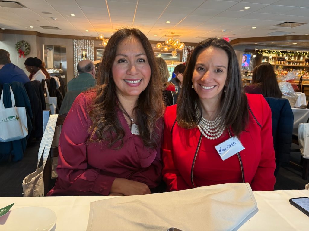 Lisa Casa and others at the WEDLI Holiday Luncheon 2024.