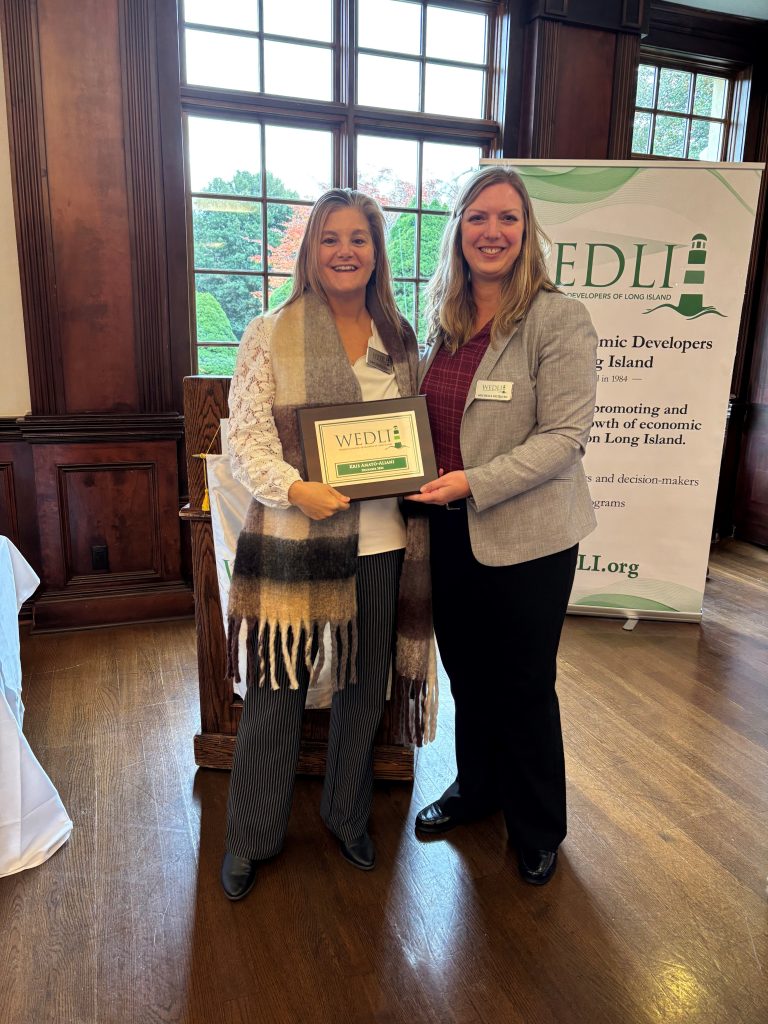 New member Kris Amato-Aliani with WEDLI President Michelle McQueen