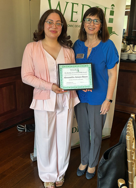 Scholarship winner Alessandra Amaya-Reyes with WEDLI President Yolanda Robano-Gross.